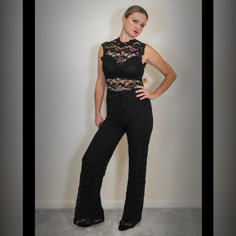 Nightcap black lace sleeveless open back jumpsuit. New w tags. Small